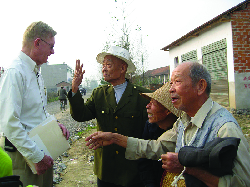 Paul visiting china and speaking with farmers who saw the crash